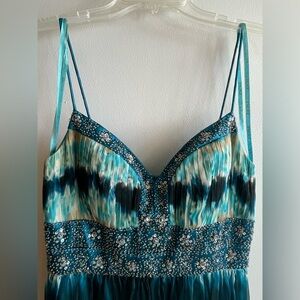 GORGEOUS multi colored maxi with delicate sequencing. Worn once, bridesmaid